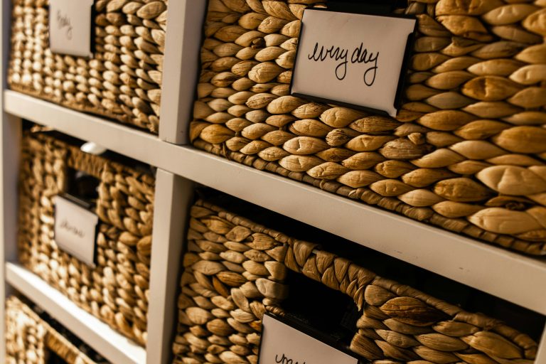 Labeled baskets on shelves